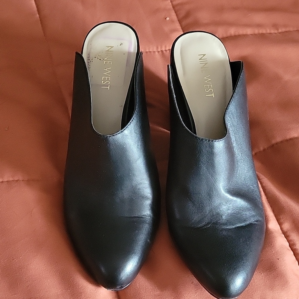 Reposhing as I have never worn since purchasing. Size 7 Nine West black mules.